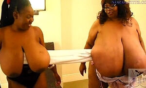Two Very Phat Bitches Play With Their Gigantic Boobs
